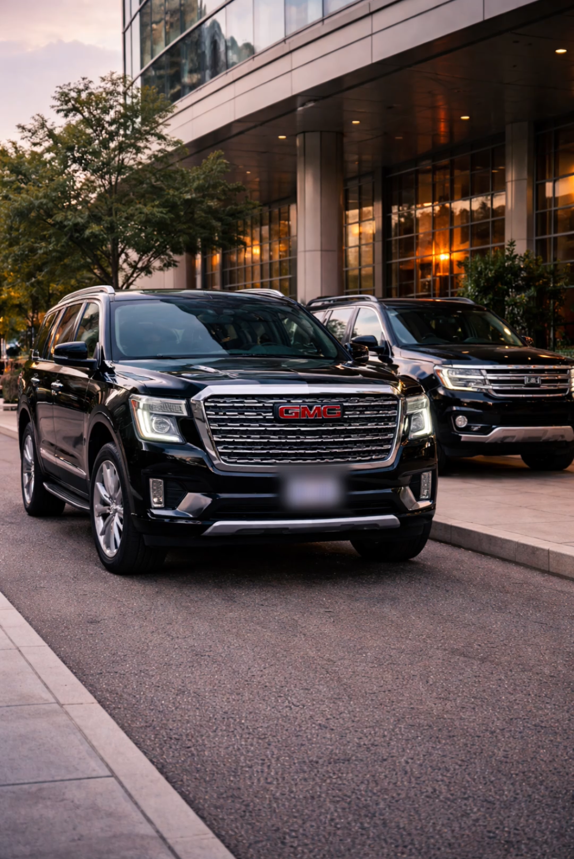 Luxury SUV driving downtown at night